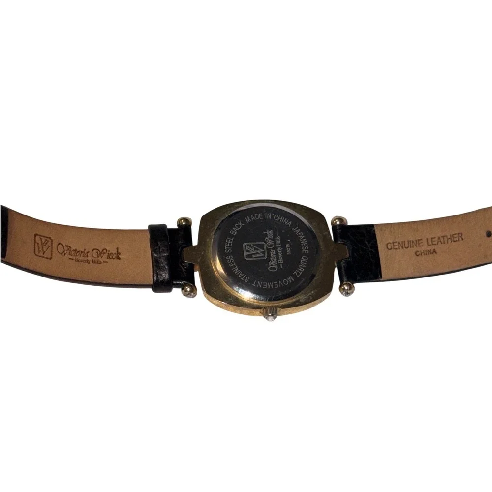 Victoria Wieck Beverly Hills Gold Tone Mother of Pearl Crystal Watch B9275 Black